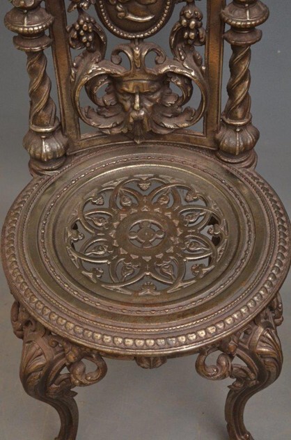 Pair Of Decorative Cast Iron Chairs