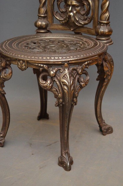 Pair Of Decorative Cast Iron Chairs