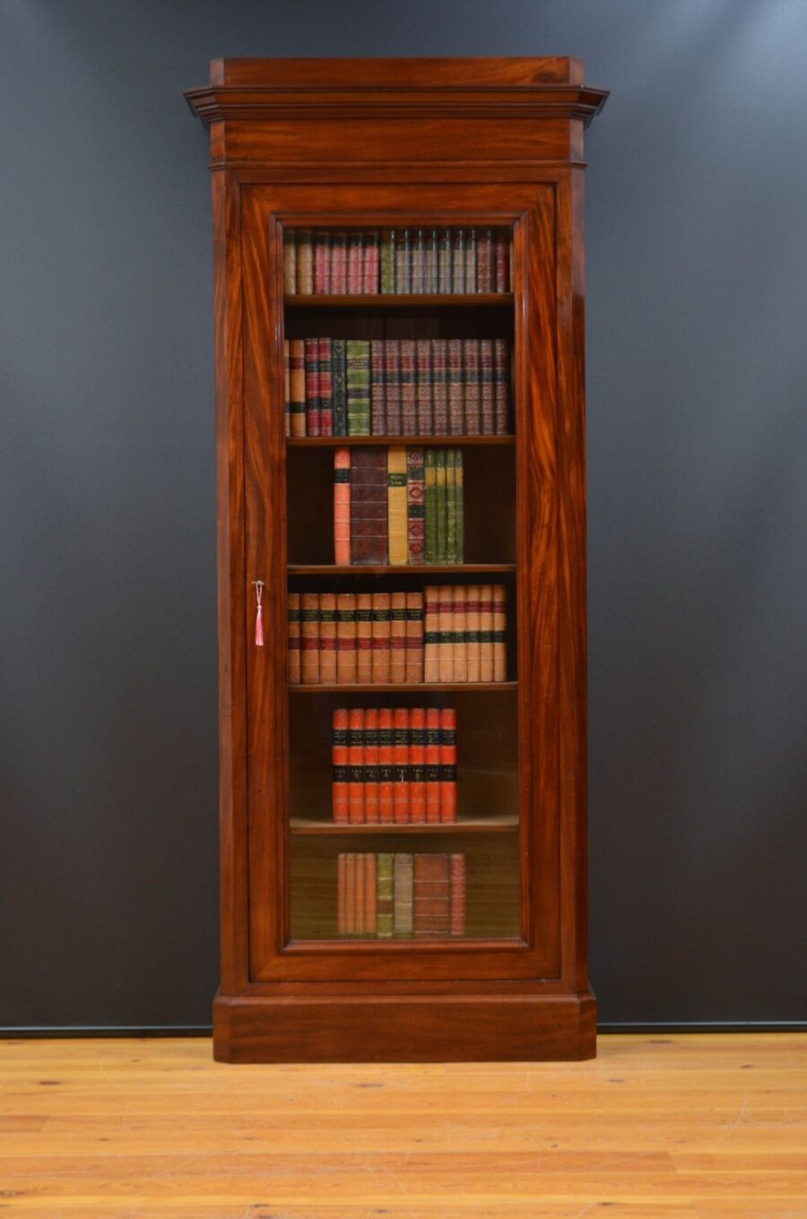 Tall and Slim Antique Bookcase in Mahogany
