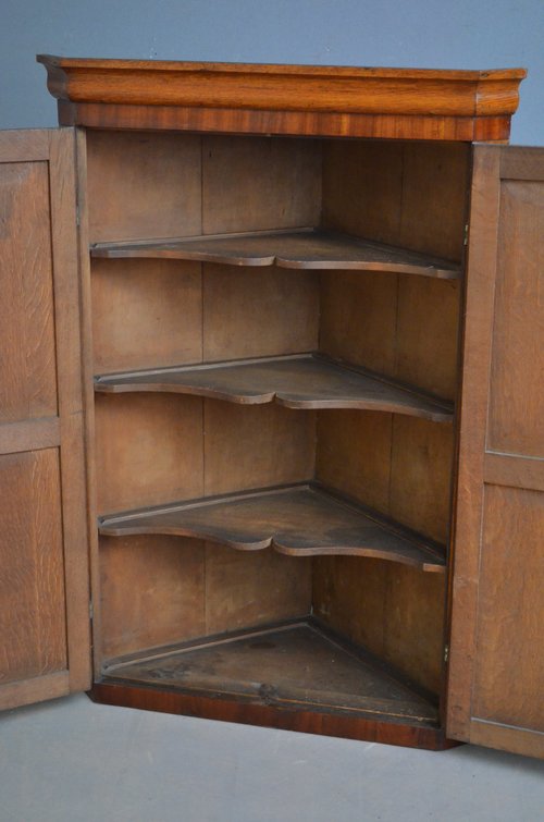 An Attractive Victorian Oak Corner Cupboard