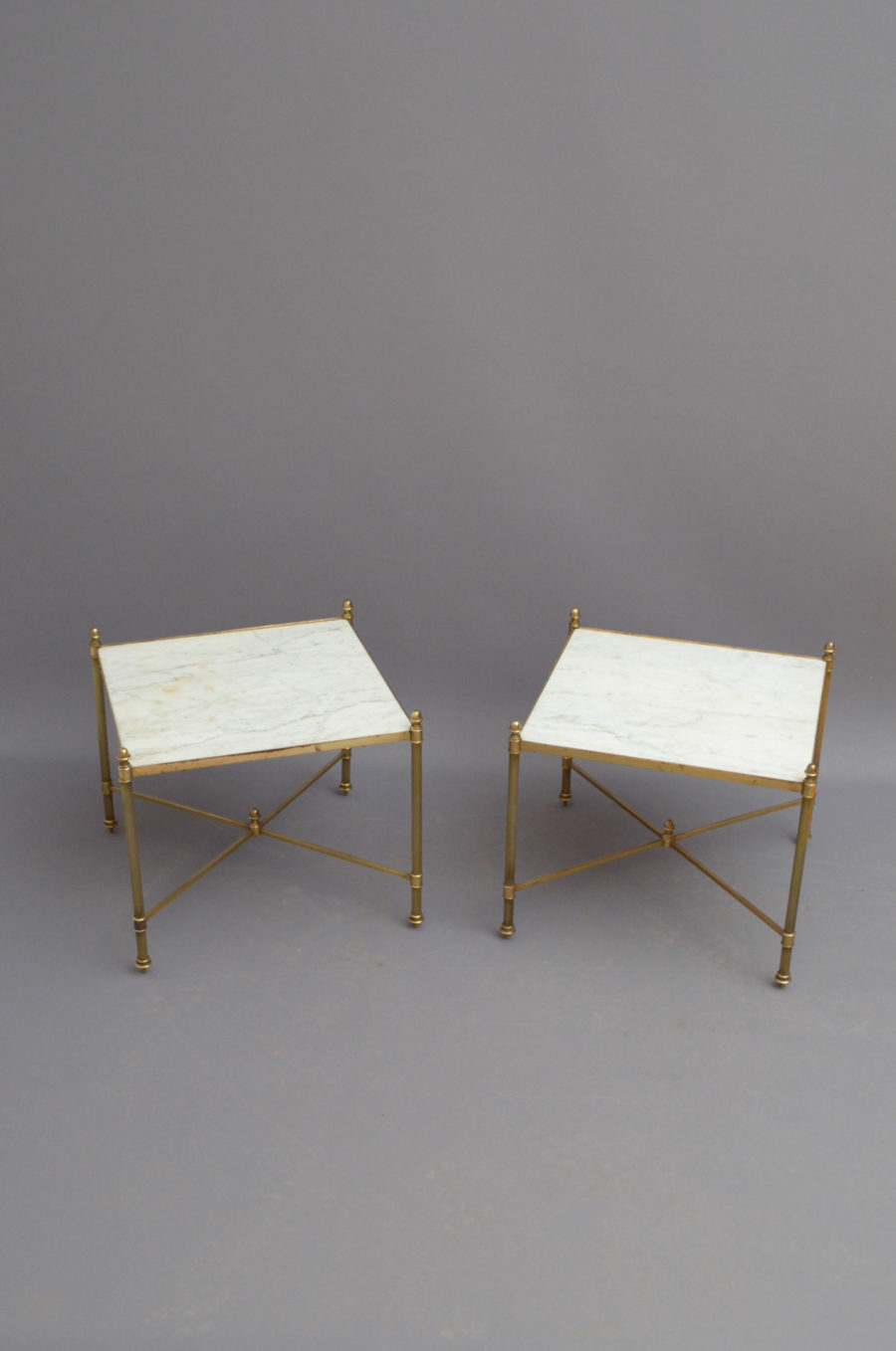 pair of brass tables